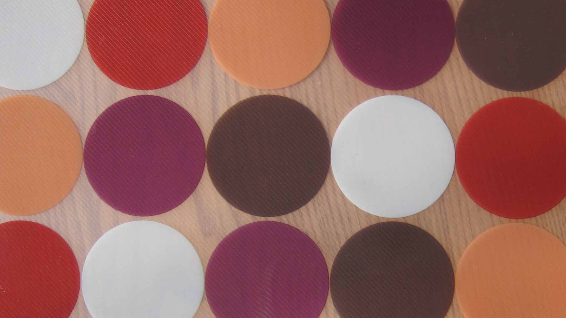 circles with various colors of red and brown placemat