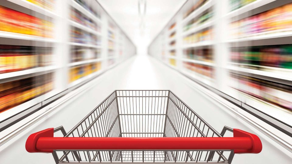shopping cart with aisle blurry