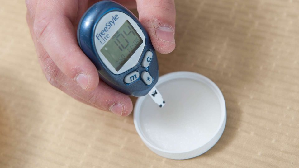 milk meter testing a sample for diabetic