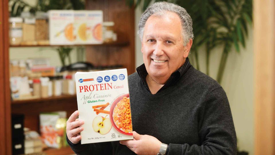Massoud Kazemzadeh kays naturals holding box of cereal